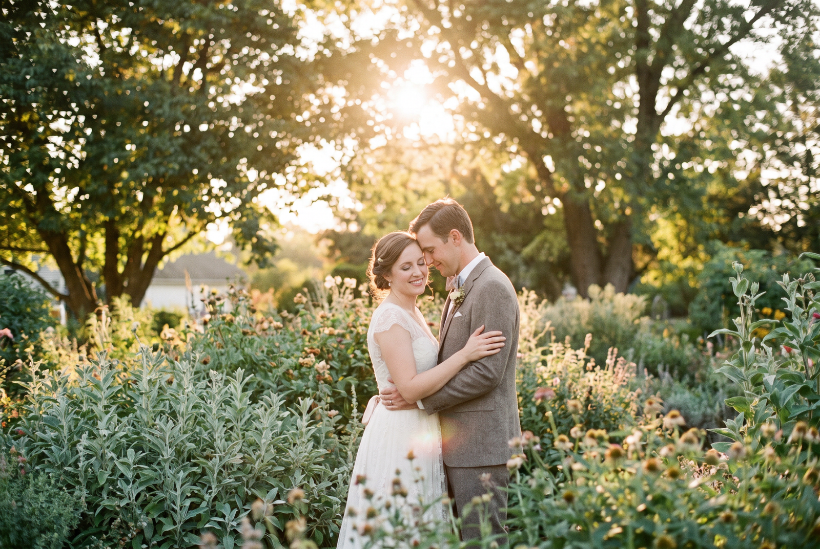 Couple embracing in golden hour light